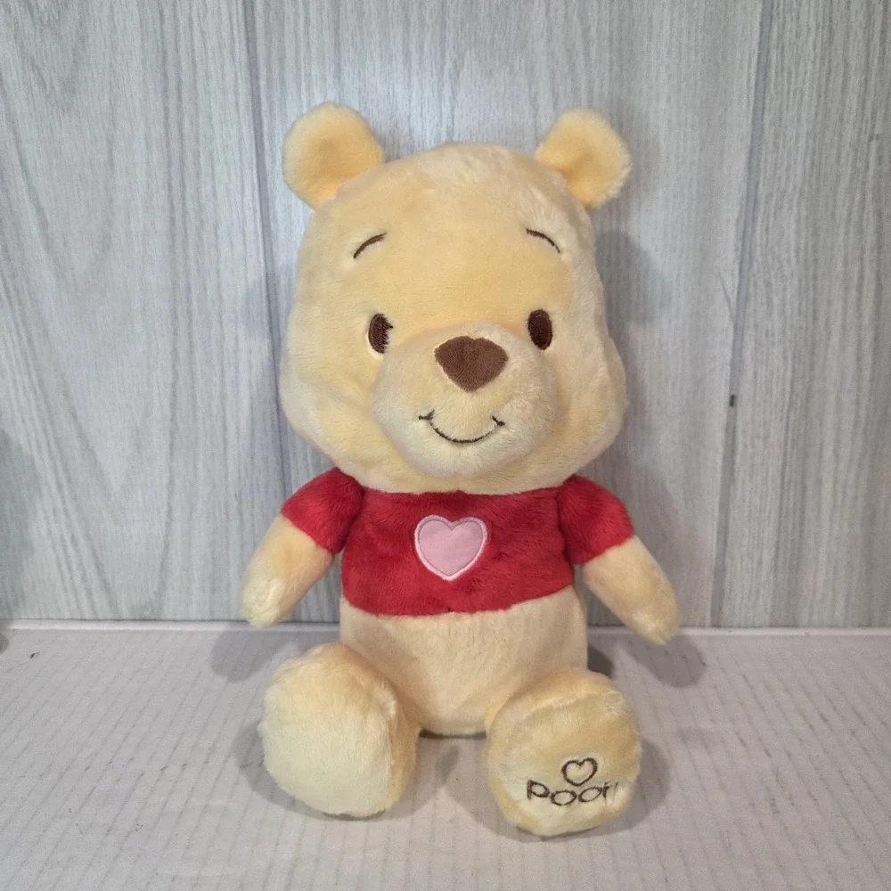 Disney Baby Winnie the Pooh Stuffed Animal, crinkle hands, heart emblemed